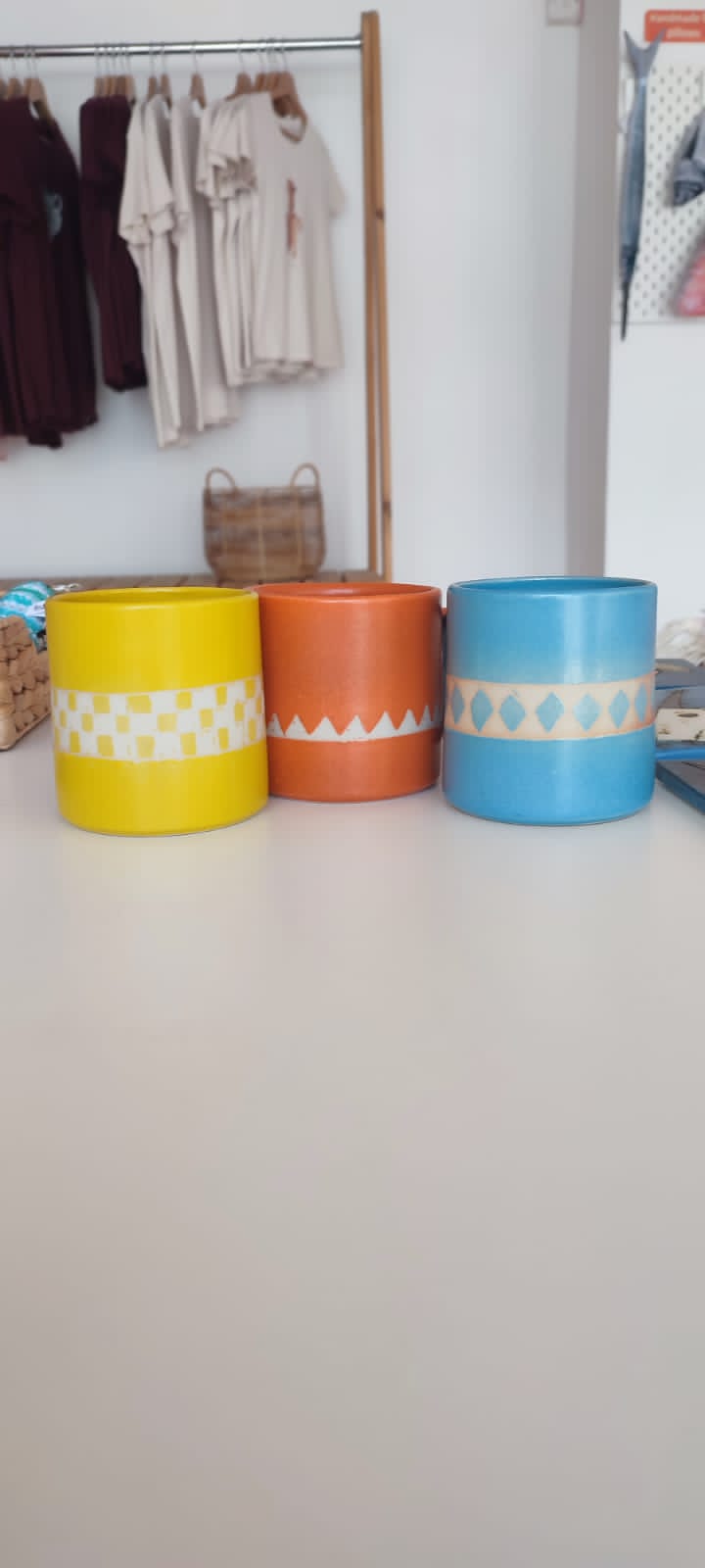 Handmade ceramic mug with patterns